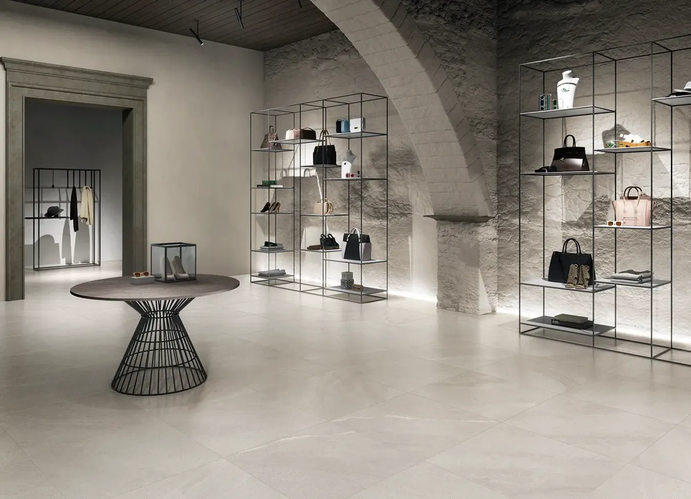 White stone effect porcelain stoneware tiles in a chic fashion boutique.