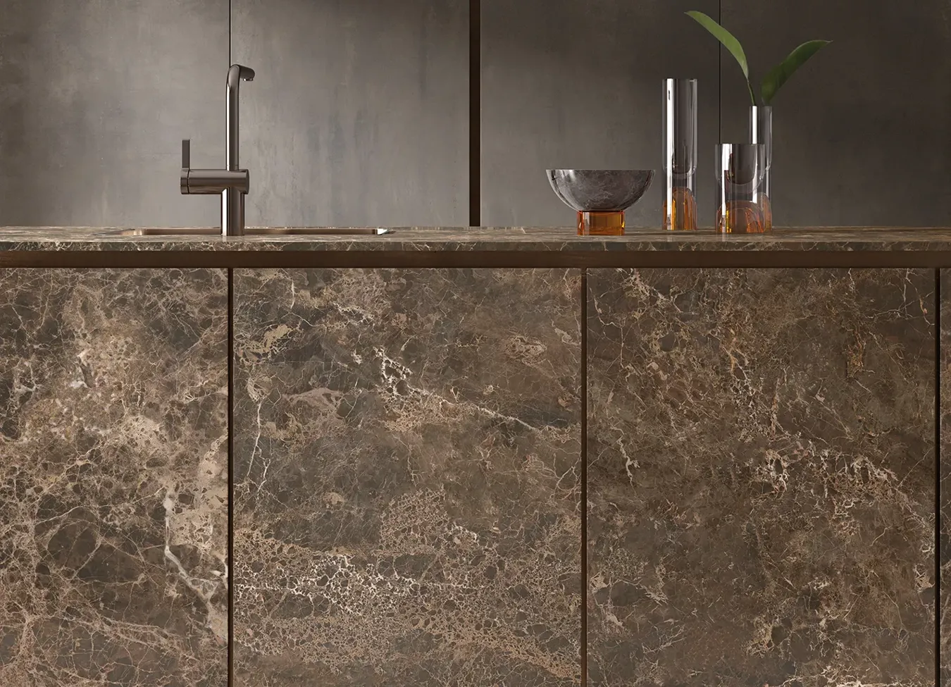 Luxury kitchen with dark wood effect porcelain stoneware tiles and modern bronze faucet.