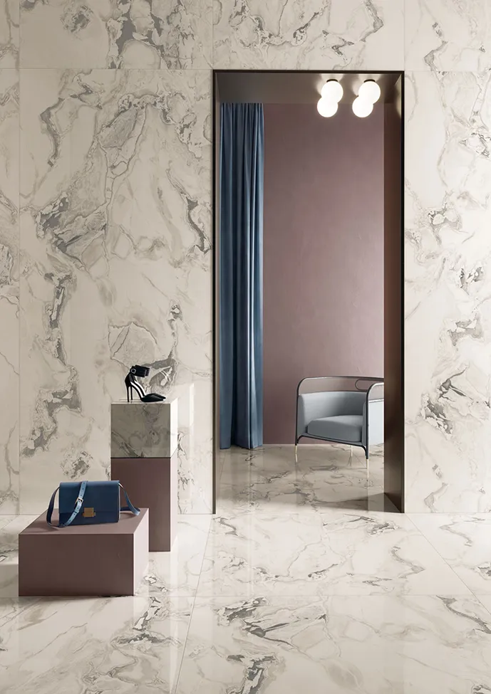 Elegant white marble effect tiles in a sophisticated interior design setting.